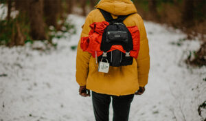 find your purpose man walking in woods with backpack on